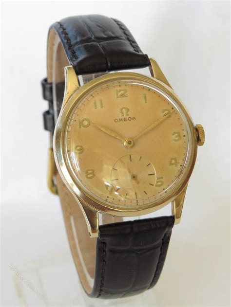 vintage omega 9ct gold watch|vintage omega watch catalog.